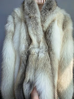 Elegant concert stage gown in floor-length fox fur coat