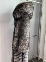 Close-up detail of dense long silver fox fur material