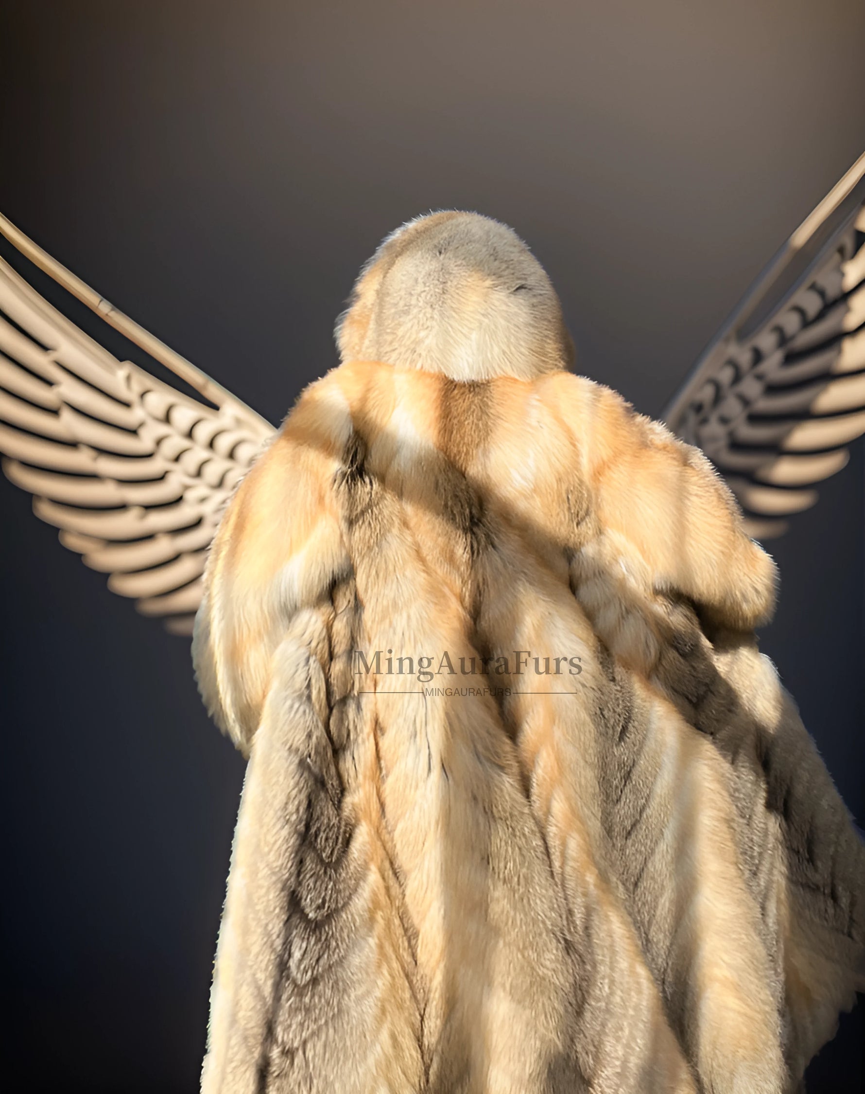 Model wearing long fox fur hooded coat in soft sunlight