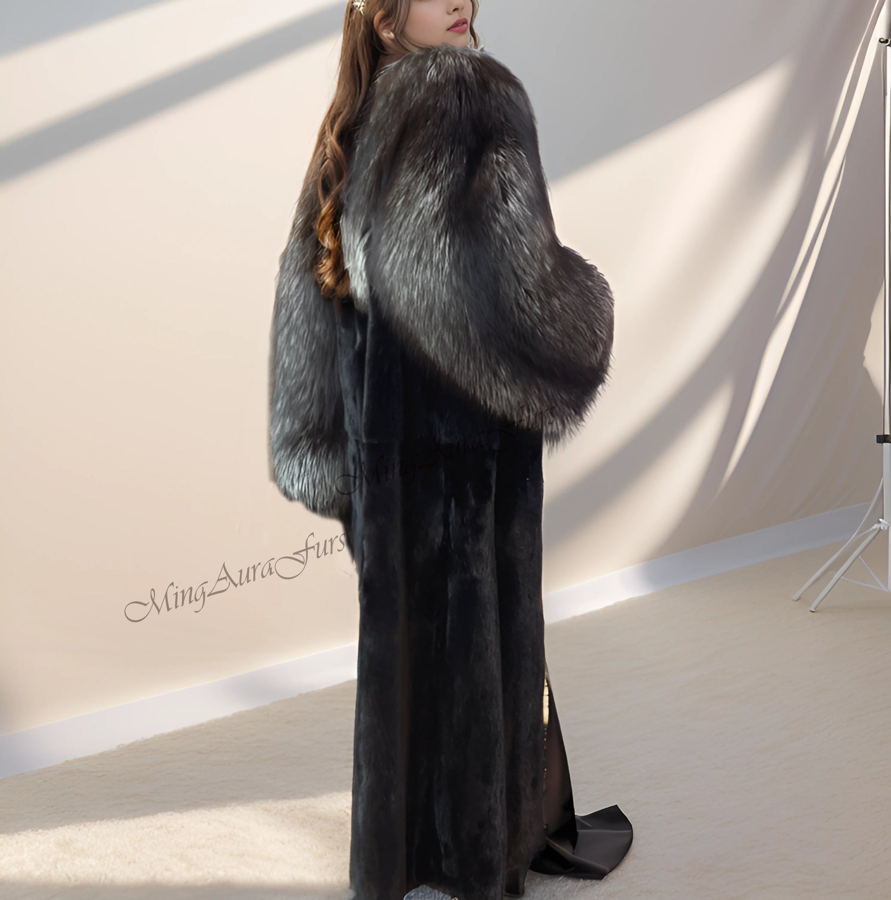 Close-up of natural silver fox fur collar paired with black mink body – rich texture contrast