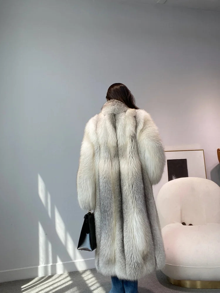 Front view of luxurious white to grey gradient fox fur coat