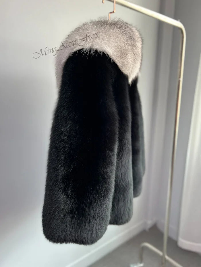 Understated luxury winter outfit with black fox fur coat