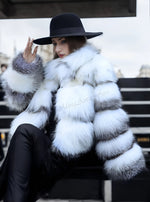 Front view of luxury black fox fur coat featuring a unique collar design