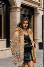 Front view of lightweight mid-length fire gold fox fur coat with soft reddish-brown tones