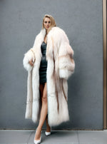 Relaxed luxury winter fashion featuring oversized creamy fox fur coat with full sweeping length